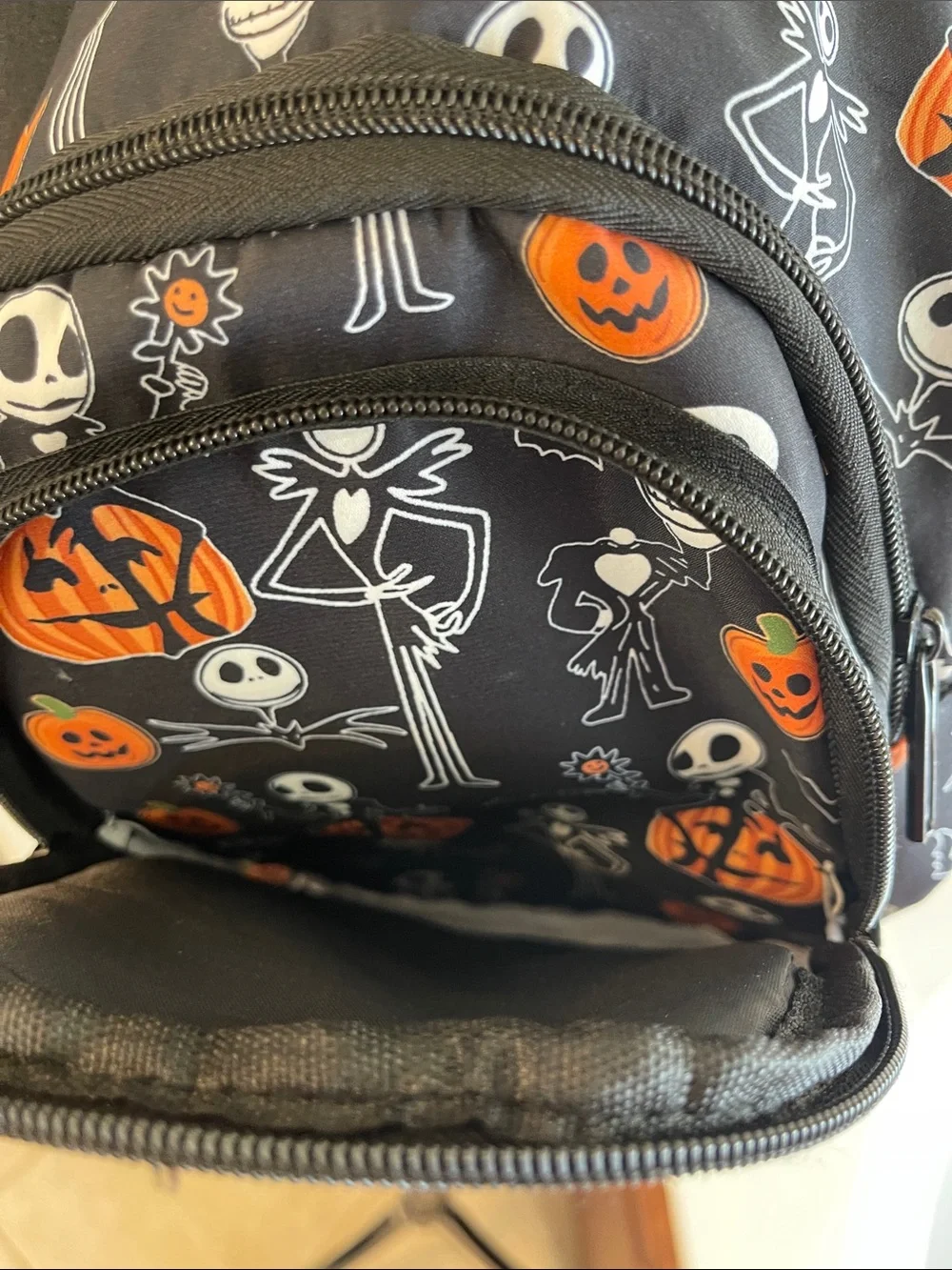 Halloween Jack Skeleton Sling Backpack - Black & Orange